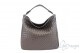 Braided “clutch” bag