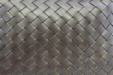 Braided “clutch” bag